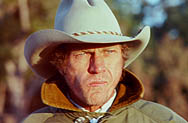 thumbnail link to photograph of Steve on location as Tom Horn, looking into the sun