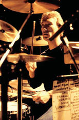 thumbnail link to photograph Rick Buckler at drums with set list